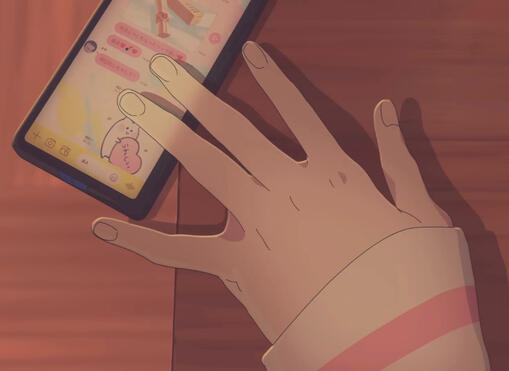 a screenshot of kusunoki muu's first music video, after pain. it shows her hand pushing her phone off of a text, screen opened to her messages with someone.